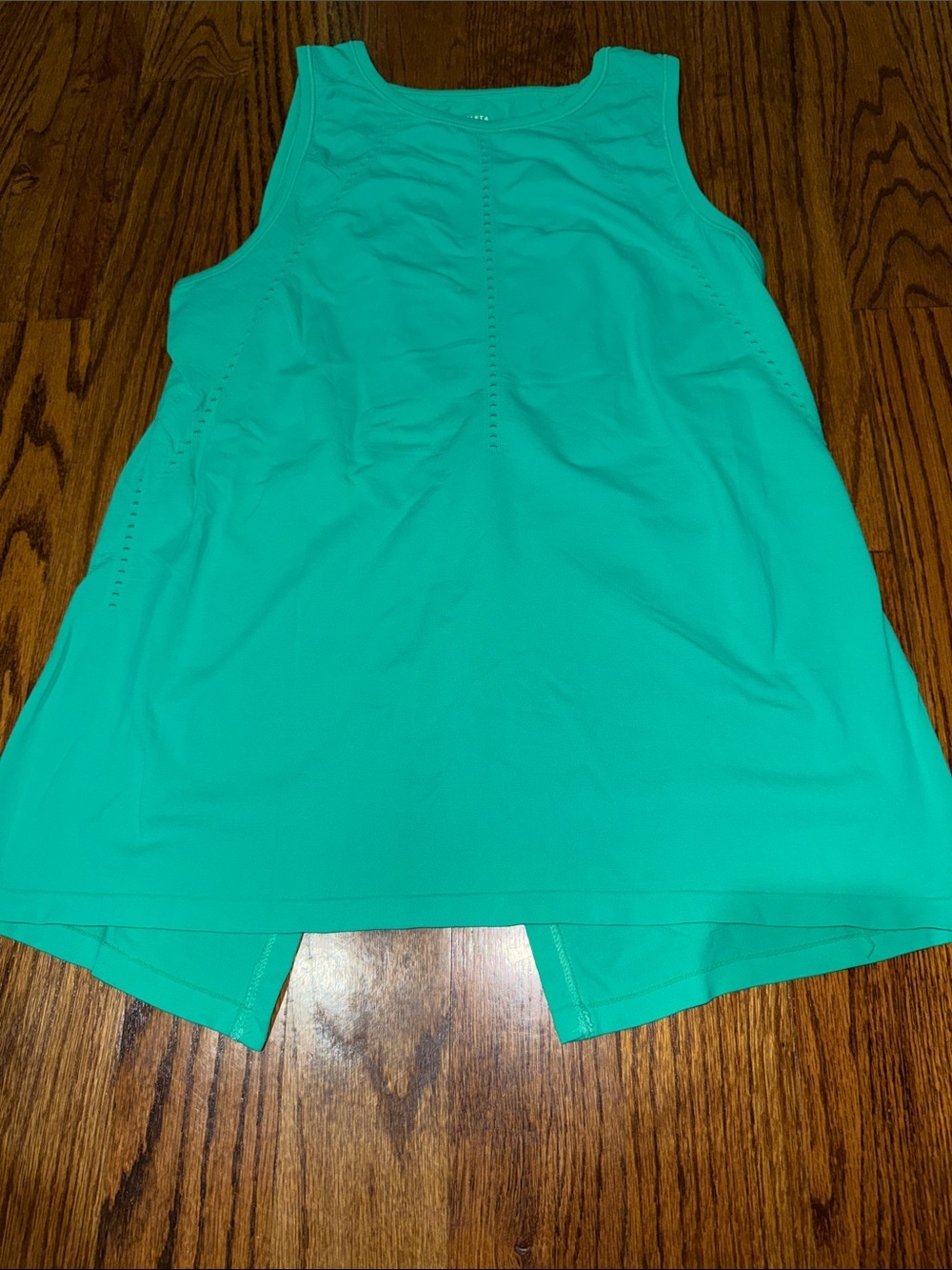 Athleta kelly green tank with split back and perforated detail small NWOT